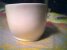 Mug, Stirnseite